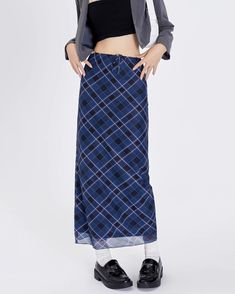 A stylish blue plaid maxi skirt with a high-waist design and drawstring closure. The skirt features a checkered pattern in varying shades of blue, creating a modern yet classic look. Its long, straight silhouette provides a sleek and elegant appearance, perfect for both casual and semi-formal occasions Size:• S: Waist: 62cm/ 24.4 in, Hips: 87cm/ 34.3 in, Length: 90cm/ 35.4 in• M: Waist: 66cm/ 26.0 in, Hips: 91cm/ 35.8 in, Length: 91cm/ 35.8 in• L: Waist: 70cm/ 27.6 in, Hips: 95cm/ 37.4 in, Length: 92cm/ 36.2 in• XL: Waist: 74cm/ 29.1 in, Hips: 99cm/ 48.9 in, Length: 93cm/ 36.6 in• 2XL: Waist: 78cm/ 30.7 in, Hips: 103cm/ 40.6 in, Length: 94cm/ 37.0 inMaterial: Polyester Fairy Aesthetic Clothes, Softgirl Outfits, Plaid Maxi Skirt, 90s Clothes, Aesthetic Sweaters, Clothes Board, Y2k Mini Skirt, Girl Aesthetics, Aesthetic Clothing Stores