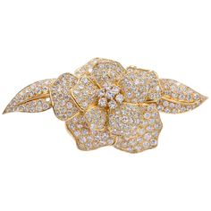 Diamond and 18k Yellow Gold 'Camellia" Flower Pin. This pin has 251 round brilliant cut diamonds with a total carat weight of approximately 15ct all set in 18k yellow gold. Stamped hallmark and maker's mark. Measurements: 3.38 inches X 1.63 inches X 0.75 inches; Engagement Ring Nails, Tattoo Rings, Ring Nails, 1930s Brooch, Rings Tattoo, Chanel Brooch, Ring Tattoos, Diamond Bows, Skincare Regimen