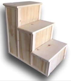 three wooden boxes stacked on top of each other