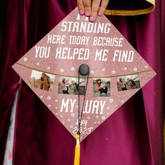 a pink graduation cap with pictures on it and the words standing here today because you helped me find my story