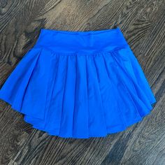 Super Cute Blue Aerie Skirt! Perfect Condition, Basically Brand New! Stretch Blue Tennis Skirt With Pockets, Blue Stretch Tennis Skirt With Pockets, Blue Stretch Swim Skirt Casual Style, Blue Lined Swim Skirt For The Beach, Blue Stretch Casual Swim Skirt, Blue Lined Swim Skirt For Beach, Casual Blue Stretch Swim Skirt, Blue Stretch Pleated Tennis Skirt, Stretch Blue Pleated Tennis Skirt