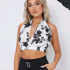 Black & White Floral Boho Cropped Halter Top With Neck Tie Closure. Fabric Is Non Stretch But The Top Does Have A Stretchy Hem. 100% Polyester Measurements Pictured Above T7 Halter Too, Boho Halter Top, Cropped Halter Top, Burgundy Crop Top, Knitted Crop Tank Top, Floral Halter Top, White Halter Top, Red Crop Top, Ruffle Crop Top