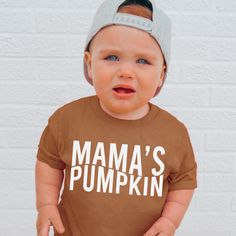 Mama's Pumpkin , Pumpkin Patch Shirt , Pumpkin Head , Pumpkin Shirt , Toddler Shirt , Baby Shirt , Fall Shirts , Fall Toddler Shirts G A R M E N T ∙ F E A T U R E S : * Uniquely soft fabric * Modern, unisex fit * Crew neck and short sleeves - Has a great comfortable fit you are sure to love F I T ∙ & ∙ S I Z I N G * Please consult size chart in pics for accurate fit. Please keep in mind that there are always slight variations in sizing. - Remember unisex tee's fit on the bigger side. F A B R I C Cotton Tops With Letter Print For Playtime, Family Matching Cotton Shirt For Playtime, Cute Family Shirt With Name Print, Cute Cotton Shirt For Family Occasions, Short Sleeve Tops With Name Print For Playtime, Brown Cotton Tops With Letter Print, Cute Fall T-shirt For Playtime, Cute Family Shirt With Letter Print, Unisex Letter Print Tops For Fall