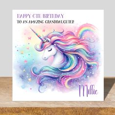 a birthday card with an unicorn's head and stars on the background, says happy cth birthday to an amazing granddaughter