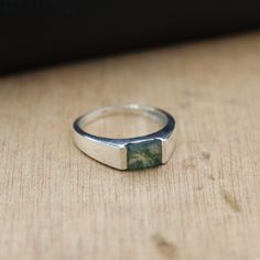 Moss Agate Signet Ring ~ 925 Solid Sterling Silver Signet Ring ~ Men's Signet Ring ~ Wedding Band Signet Ring ~ Handmade Ring ~ Unique Ring ❥ Metal: Solid sterling silver ❥ US Ring Size: Choose Size ❥ Stone Size: 6*8 mm Octagon Emerald Cut ✈ Free Shipping (USPS) ✈ Free Shipping to the United Kingdom 🎁 Free Gift Box ↻ 3 Days Return ⌛ 3-Day Handling Time General Care Instructions Remove jewellery when showering or bathing. This is particularly important when on the beach, in the sea and in chlori Mens Sterling Silver Jewelry, Signet Ring Men, Moss Agate Ring, Silver Signet Ring, Ring Wedding Band, Mens Silver Rings, Unique Ring, Ring Unique, Mens Wedding Rings