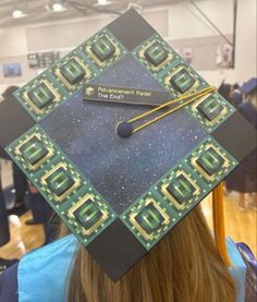 a graduate's cap that has been made to look like an electronic circuit board