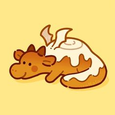 a brown and white cow laying on top of a yellow floor next to a cup