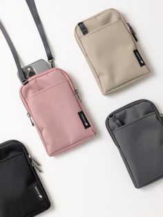 Editor's NotesPhone Crossbody  Bag is a lightweight cross bag that can carry phone and small belongings when traveling or just for daily use. There are pockets on the inside and outside for convenient storage of small items. It comes with a separate detachable cross strap.  - Waterproof fabric- Detachable shoulder strap- Zipper closure- 5 colors Measurements (in.)- 4.3 in. x 6.7 in. x 0.7 in. Composition & Care- Polyester, Nylon Designer- by TRAVE Pouch Ideas, Mobile Bag, Crossbody Bag Pattern, Korean Accessories, Mobile Pouch, Money Pouch, Cell Phone Pouch, Lightweight Bag, Mini Tote Bag