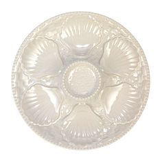 an empty glass plate on a white background