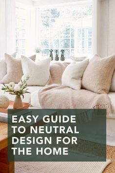 a living room with couches and pillows on the floor, text overlay reads easy guide to neutral design for the home