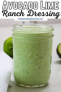 an avocado lime ranch dressing in a mason jar with the title above it