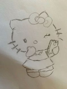 a drawing of a hello kitty on the wall