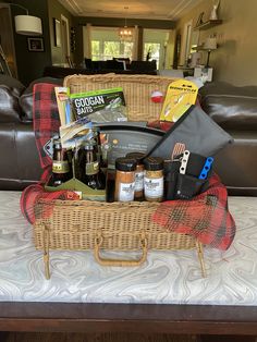 the picnic basket is full of food and drinks