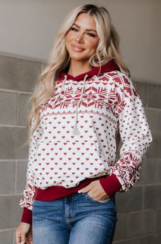 White base with red holiday design & accentsStretch: triple stretch // TTS for an oversized lookMaterial: 95% cotton, 5% spandex