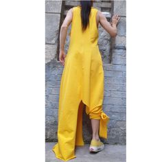 Yellow Asymmetrical Hem Dress For Spring, Spring Yellow Dress With Asymmetrical Hem, Yellow Asymmetrical Hem Beach Dress, Yellow Asymmetrical Beach Dress, Yellow Beach Dress With Asymmetrical Hem, Yellow Asymmetrical Maxi Dress For Summer, Yellow Fitted Asymmetrical Dress, Fitted Yellow Maxi Dress With Asymmetrical Hem, Yellow Fitted Asymmetrical Summer Dress