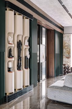 a living room filled with lots of furniture next to a wall mounted radiator