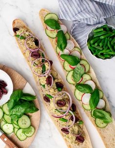 an assortment of food items displayed on wooden cutting boards