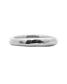 a white gold wedding ring on a white background