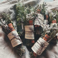 herbs wrapped in twine and tied with twine on top of a white cloth