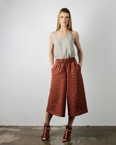 "One of the most stylish and versatile clothing pieces - wide and sweeping linen culottes. Tailored from Lithuanian softened linen fabric they make a great clothing piece for the office, effectively creates a stunning evening look as well. Design features an elastic waistband and side pockets that add a touch of elegance and comfort to even the simplest outfits. FABRIC: 100% softened Lithuanian linen COLOR: Please choose the desired color from the side menu. STYLE: Softened linen culotte pants w Linen Culottes, Well Design, Natural Linen Dress, Linen Wide Leg Pants, Pants For Woman, Versatile Clothing, Pants Linen, Culotte Pants, Wide Leg Linen Pants