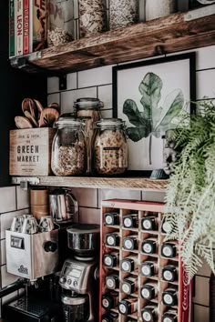 the shelves in this kitchen are filled with spices and other things to make it look like they have been made out of wood