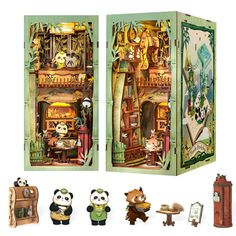 an open book with pandas and other animals inside it, including a clock tower