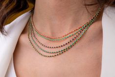 Our colorful enameled beaded chain necklace is 14k solid gold and it has five different color options, like turquoise, blue, dark blue, dark green and baby pink. These beads are made with meticulous workmanship enameled art that looks vivid. It is a delicate chain that anyone can use from 7 to 70.  The diameter of a ball on the chain is 3.37 mm, and the length of a ball is 1.51 mm. We can design the necklace in any size you want within the ranges we provide (15, 16, 17 and 18 inches). If you would like to custom size, please feel free to message us. This mini Italian ball chain will accompany you at any time of the day with its minimalist style.  You can easily combine with your other necklaces and chains. Also, you can combine it with its bracelets. Our chain necklace can be your favorite Green Round Jewelry With Tiny Beads, Green Jewelry With Tiny Beads, Chain Layering, Unique Postcards, Minimalist Summer, Jewelry Christmas, Necklace Minimalist, Delicate Chain, Special Jewelry