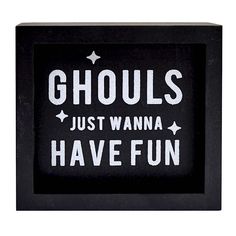 a black frame with white lettering that says ghouls just wanna have fun on it