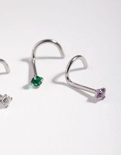 Description Mix up your look and show off the individual you are with Lovisa body jewellery! This 3-pack of nose studs is made from rhodium-toned surgical steel. Pieces have a gauge of 20, and a length of 0.8mm. The studs a finished with glittering diamantes in crystal, pink and green tones. | Lovisa Surgical Steel Rhodium Classic Gem Nose Stud Pack, Size: 20G/0.8 Nickel Free Silver Metal Nose Rings, Nickel-free Silver Metal Nose Ring, Hypoallergenic Silver Surgical Steel Piercings, Hypoallergenic Silver Metal Body Jewelry, Silver Surgical Steel Piercings As Gift, Silver Hypoallergenic Round Nose Studs, Hypoallergenic Silver Round Nose Studs, Internally Threaded Silver Sterling Nose Studs, Silver Internally Threaded Round Nose Studs