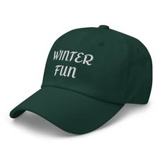 Dad hats aren't just for dads. Get your Winter Fun hat and get ready for some cold winter fun! 100% chino cotton twill Unstructured, 6-panel, low-profile with 6 embroidered eyelets 3 ⅛” (7.6 cm) crown and adjustable strap with antique buckle FREE SHIPPING! Please allow 7 -12 days for delivery. This product is made especially for you as soon as you place an order, which is why it takes us a bit longer to deliver it to you. Making products on demand instead of in bulk helps reduce overproduction, Trendy Winter Baseball Cap With Curved Brim, Trendy Winter Baseball Cap, Cotton Beanie Hat With Letter Print, Winter Streetwear Dad Cap, Winter Cotton Hats With Letter Print, Trendy Winter Dad Hat, One Size, Casual Winter Hats With Letter Print, Cotton Baseball Cap For Winter Streetwear, Trendy Winter Outdoor Baseball Cap