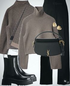 a woman in grey sweater, black pants and boots with handbag next to purse