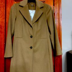 Beautiful Trench Coat. Mid Knee To Calf Length. Never Worn. Still Has Tags. 35” In Length From Shoulder. 60% Wool 30% Polyester 5% Cashmere 3% Rayon Elegant Camel Outerwear For Spring, Formal Camel Outerwear For Fall, Elegant Single-breasted Camel Outerwear, Fitted Camel Elegant Outerwear, Calvin Klein Brown Outerwear For Fall, Fitted Elegant Camel Outerwear, Elegant Camel Outerwear For Office, Elegant Fitted Camel Outerwear, Elegant Calvin Klein Outerwear For Fall