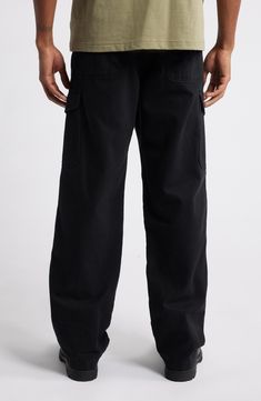 Made from cotton duck canvas for ultimate durability, these utility-inspired cargo pants are packed with pockets for a functional finish. Zip fly with button closure Front slant pockets; back patch pockets; cargo flap-patch pockets 100% cotton Machine wash, tumble dry Imported Canvas Cargo Pants, Duck Canvas, Platform Slippers, Maternity Shops, Pointed Toe Shoes, Loungewear Shorts, Designer Clothes For Men, Modern Outfits, Denim Jumpsuit