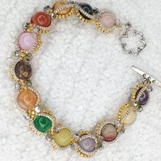 Handmade~Empty Nest Gemstone Bracelet Made With A Variety Of Gemstones Along With Silver And Gold Galvanized Seed Beads And Crystals 7½" In Length Handmade By Me! Designed By Allie Buckman At Potomacbeads Dot-Com Gift Box Available Upon Request New In Package Any Questions? Just Ask! Daily Shipping~Packaged With Care! Open To Offers! Silver Crystal Bracelet With Stones, Adjustable Silver Crystal Bracelet With Stones, Crystal Bangle Bracelets With Stones, Silver Rondelle Gemstones For Jewelry Making, Silver Crystal Bracelet With Round Gemstone Beads, Silver Crystal Bracelets With Gemstone, Bohemian Round Beaded Bracelets With Stones, Bohemian Beaded Bracelets With Stones, Adjustable Costume Jewelry Bracelets With Stones