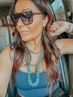 Get ready to ride off into the sunset in style with our Dixie Necklace! This 36" of turquoise and faux Navajo pearl graduated discs add the perfect western touch, letting you unleash your inner wild thing without a second thought! Wear it with any look and get your wild on! Get it now!All Jewelry is Final Sale and Non-Returnable. Buy Dixie Necklace Now! Western Fashion Jewelry, Turquoise Jewelry Necklace, Western Turquoise, Bohemian Boutique, Earrings Western, Western Necklaces, Fringe Crossbody Bag, Turquoise Hoop Earrings, Turquoise Hoops