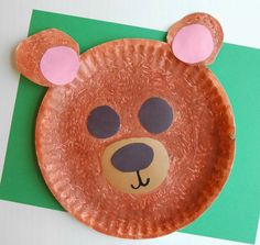 a paper plate with a bear face on it