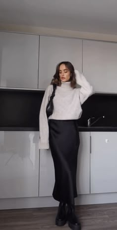 Long Silk Skirt And Sweater Outfit, Silk Skirt Autumn Outfit, Satin Skirt Grey, H And M Boots, Satin Dress With Pullover, Black Silk Skirt Fall Outfit, Fall Modest Skirt Outfits, Cold Outfits Night Out, Black Maxi Skirt With Sweater