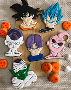 dragon ball brooches are sitting on a table