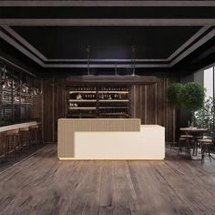 an empty restaurant with wooden floors and black walls is pictured in this image, there are several bar stools on either side of the counter