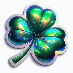 a four leaf clover shaped sticker sitting on top of a white surface with green and blue colors