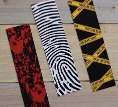 three different types of ties with caution tape on them