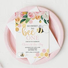 a pink plate with a card on it that says, so sweet to bee one