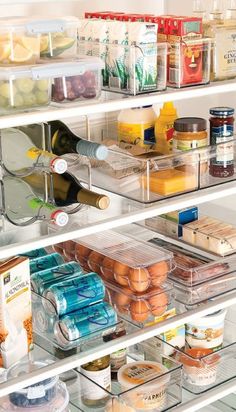 a refrigerator filled with lots of food and condiments on it's shelves