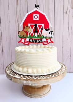 a cake that has been decorated with farm animals and the words i love chase on it