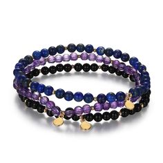 PRICES MAY VARY. Set of three genuine gemstone stretch bracelets featuring 4mm black agate, African amethyst, and Lapis Lazuli beads in a station design Bracelets accented with 18k yellow gold plated bronze spacer beads and tags Perfect jewelry gift to expand a woman's fashion wardrobe with a modern, on trend style Bracelets can be worn individually or all together for a trendy layered look Hand-crafted in Bronze; Fine Silver plating added to increase durability; 18K Yellow Gold plating added to Black Amethyst Beaded Bracelets, Black Amethyst Gemstone Beaded Bracelets, Purple Stackable Jewelry With Round Beads, Gold Beaded Bracelets, Purple Bracelet, Dainty Bracelet, Gold Bead Bracelets, Woman's Fashion, Bracelet Design