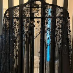 Brand New Designer Abaya By Zouzan In Dubai! Handmade Net Material Originally Purchased For $450. Sheer Fabric With Beaded Handwork. Black Silk Evening Kimono, Bohemian Black Evening Abaya, Elegant Black Kaftan With Kimono Sleeves, Evening Embellished Black Abaya, Elegant Black Kimono For Evening, Black Embellished Evening Abaya, Evening Black Embellished Abaya, Elegant Black Evening Kimono, Luxury Long Evening Abaya