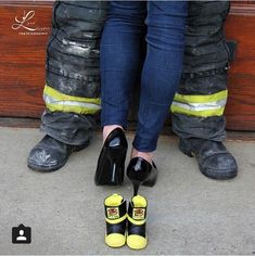 two people standing next to each other wearing fireman's boots and slippers