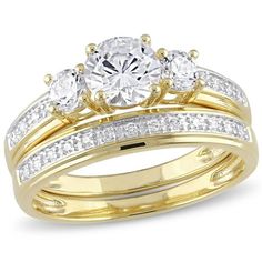 two tone gold wedding ring set with round cut diamonds on each band and side stones