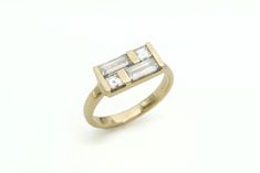 Art Deco Diamond Engagement Ring Baguette Diamond Ring - Etsy Diamond Ring With Baguette Diamonds And Rectangular Stone, Modern Rings With Baguette Diamonds, Art Deco Jewelry With Rectangular Baguette Diamonds, Modern Rectangular Diamond Ring, Modern Rectangular Diamond Ring For Anniversary, Modern Rectangular Diamond Anniversary Ring, Modern Diamond Baguette Rings, Art Deco Baguette Diamond Rectangular Ring, Art Deco Rectangular Baguette Diamond Ring