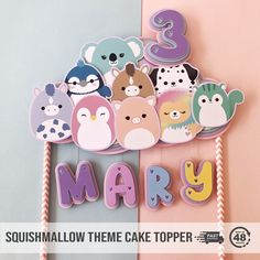 a cake topper with some animals on it and the words mary written in large letters